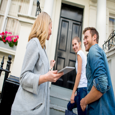 mortgage loans near gouverneur ny image of couple meeting with realtor for home showing