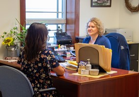 gouverneur loan officer meeting with customer