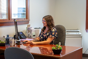 consumer loans gouverneur ny bank employee at desk